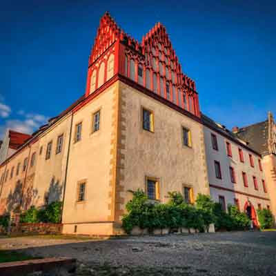 河南廠家平面仿石多彩漆別墅應(yīng)用